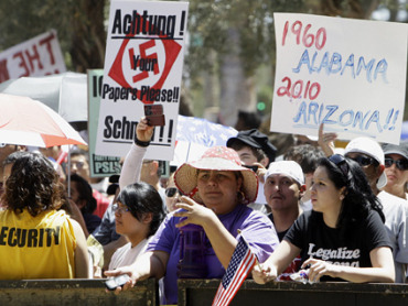 Protesters show their hatred towards Arizonas immigration law.