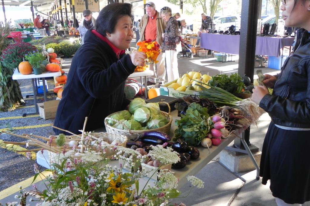 Young Skeen, who works at Beulah Meadows, explains how to use edible flowers for cooking.