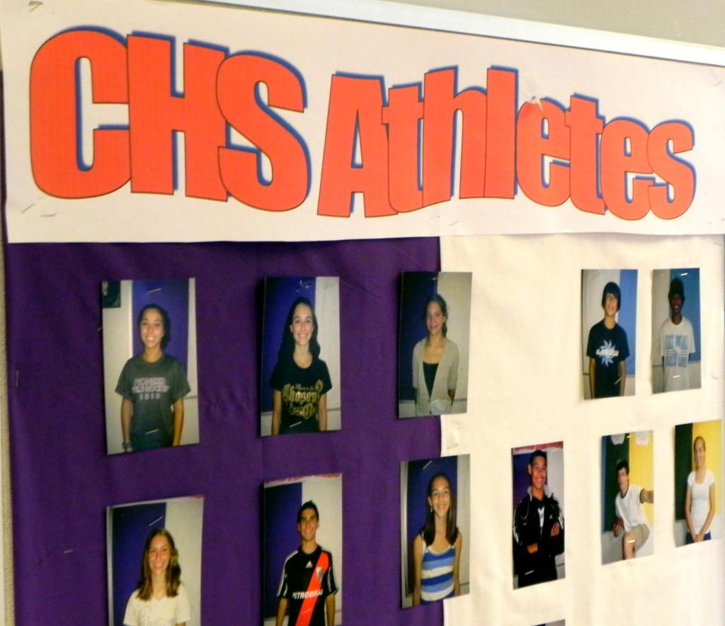 The board outside of Bodley Hall displays the athletes at CHS and members of CHAT.