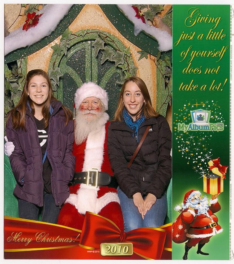 Ella Bourland and Helen Januszewski get their pictures taken with Santa at Briarwood Mall.