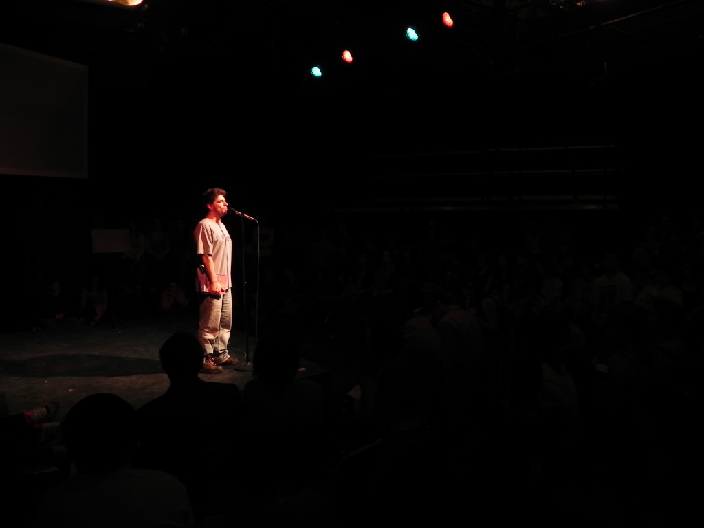 Jeff Kass emcees the 2011 Community High School Poetry Slam.
