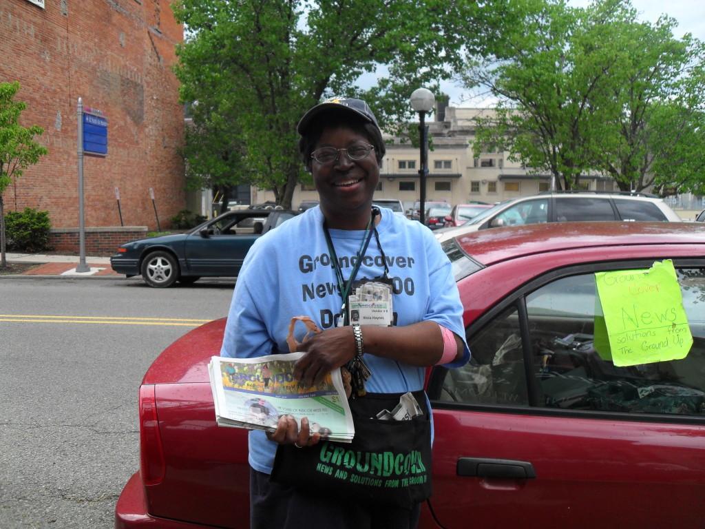 Rissa Haynes, a vendor for the homeless Newspaper Groundcover, outside Café Verde. 