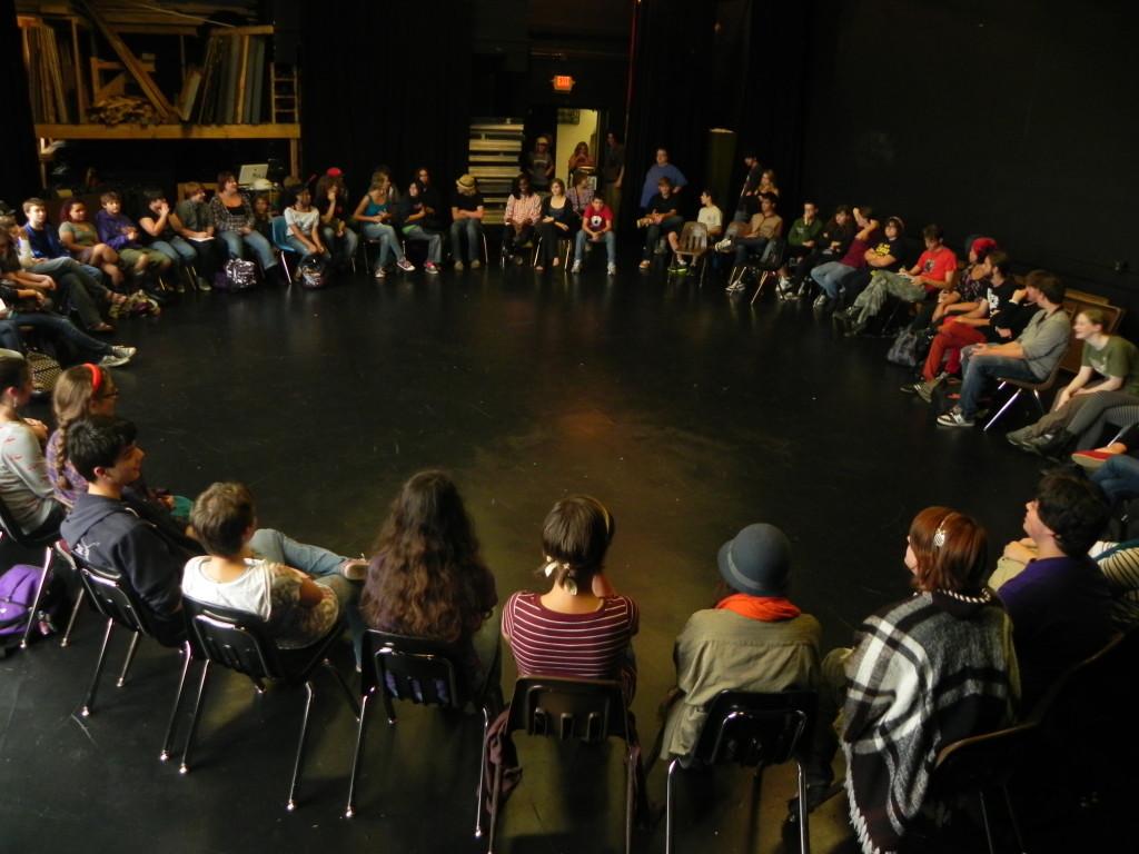 Students gather in The Craft Theater for a CET meeting.