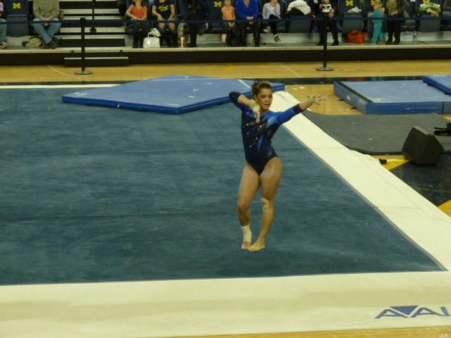 Junior and co-captain Brittnee Martinez performs for the judges on floor. 