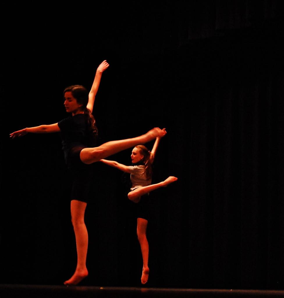 Dancers take the stage to block and rehearse. 