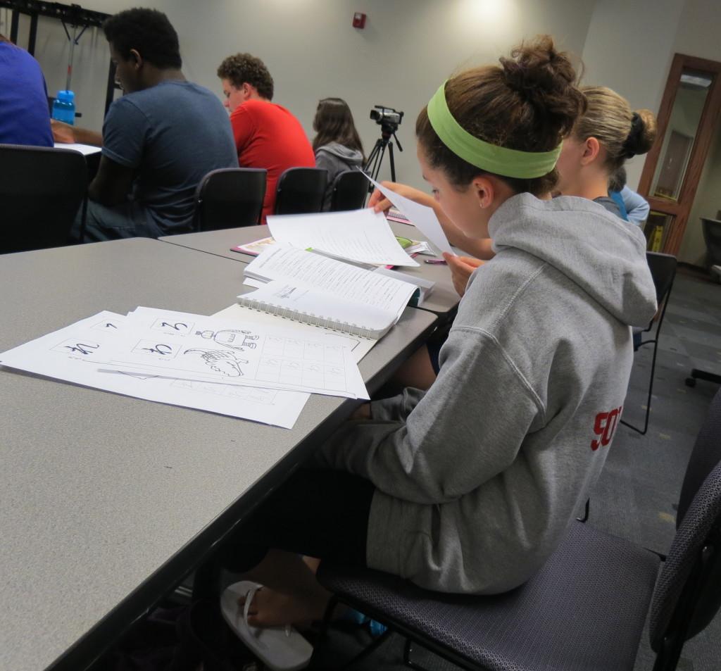 Student Ambassador, Mia Sowder working on the worksheets they got in class.