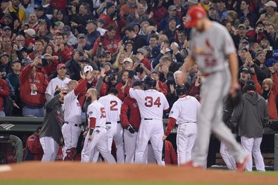 The Boston Red Sox celebrate after winning the World Series.