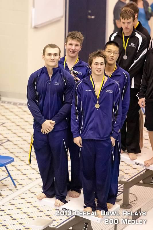 Pioneer Swimmers Max Cornblath, Jiaming Shen, Kai Williams and Thad Stalmack celebrate a first place finish in the 200 Medley. In addition to winning the event they shattered a record from the 1980s.