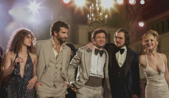 “American Hustle” is Breezy ’70s Escapism With Genuine, Penetrating Edge