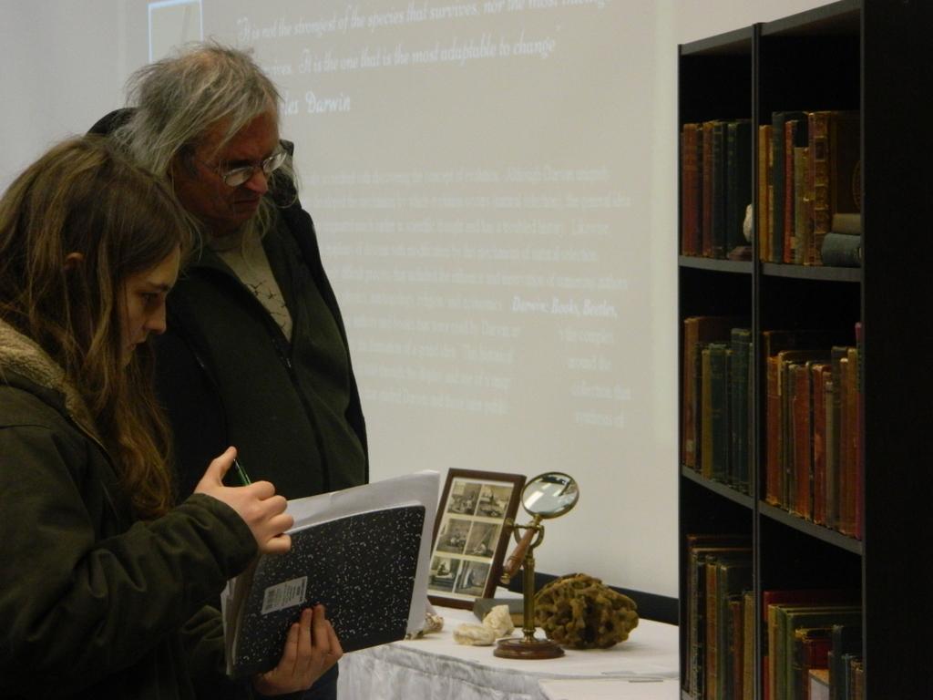 Audience members examine Wootens collection following Wednesdays lecture.