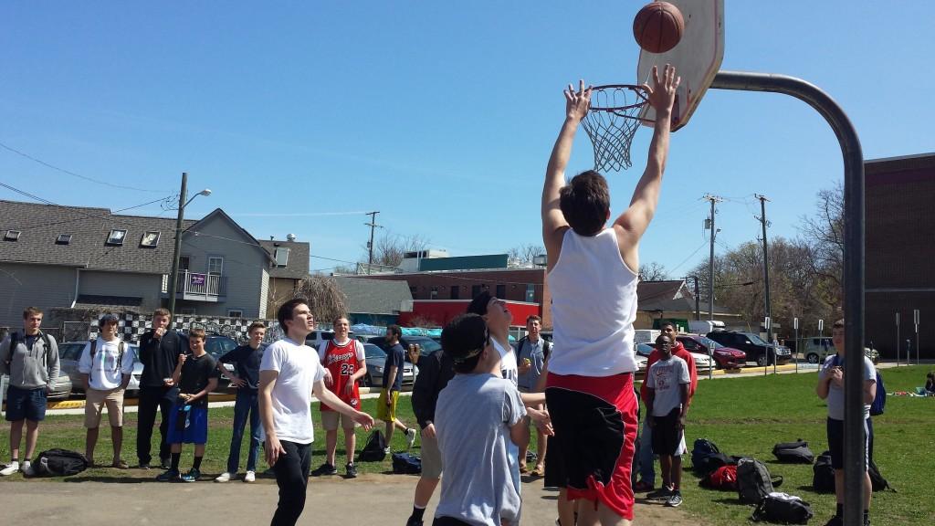 Jack McConnell, Merrick Squad big-man, attacks the basket.