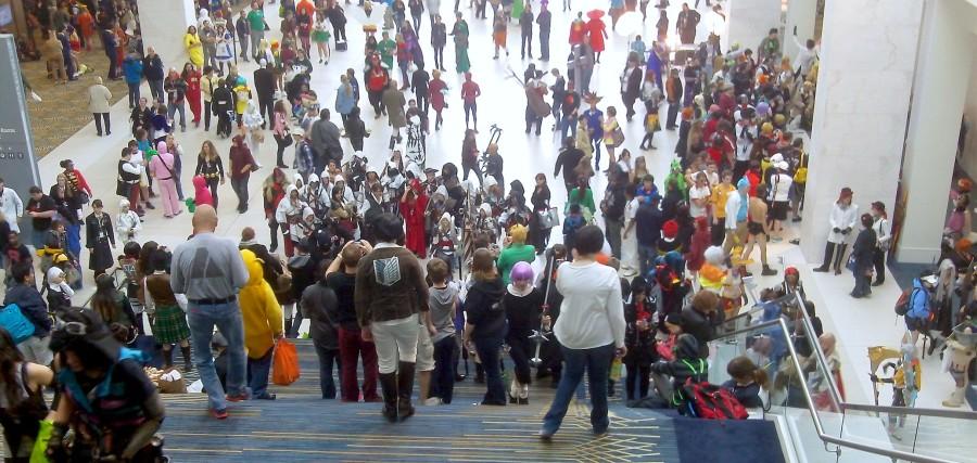 Various cosplayers making an appearance at the Cobo Center. At the bottom of the stairs is an organized Assassins Creed photoshoot.