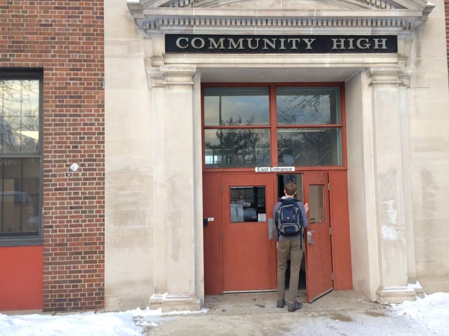 Matthew Ferraro opens the front door to Community High School as an official student after two and a half years of waiting