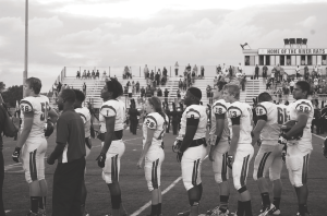 The football team lines up to play. 