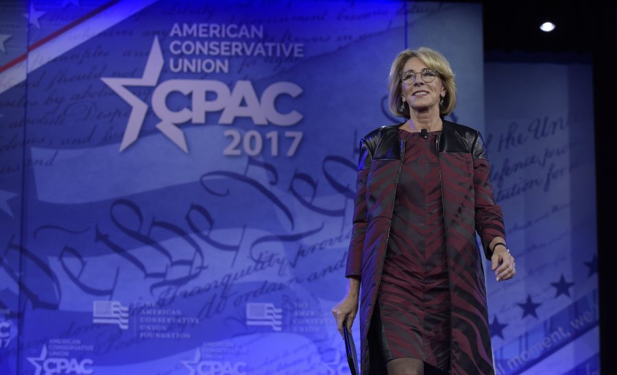 Secretary of Education Betsy DeVos at the 2017 Conservative Political Action Conference. DeVos has plans to radically change the way public education operates, mostly by entrusting schooling to private businesses. (AP Photo/Susan Walsh)