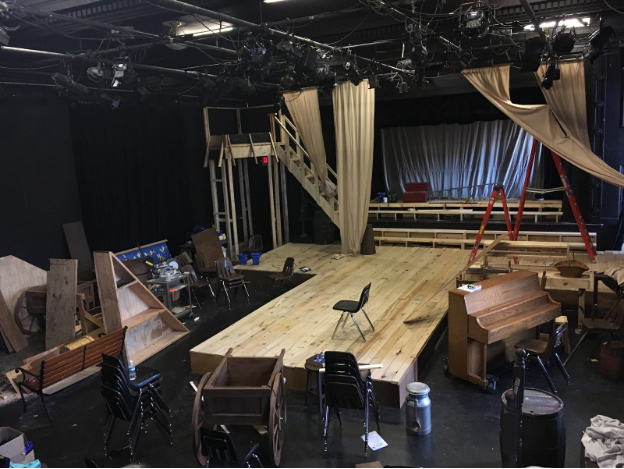Craft Theater is filled with the great presence of the new thrust stage. The stage was assembled with 4-foot platforms from past shows. While the decking was a two week process, the assembly of the stage as a whole only took a day. 