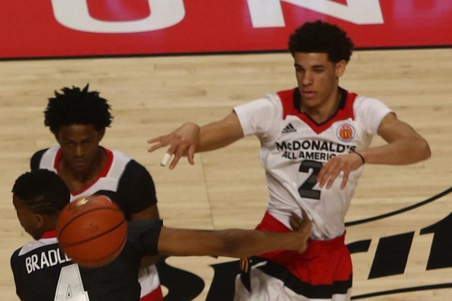 Lonzo Ball(white jersey) and DeAaron Fox(top black jersey) playing during the 2016 McDonalds All-American game.