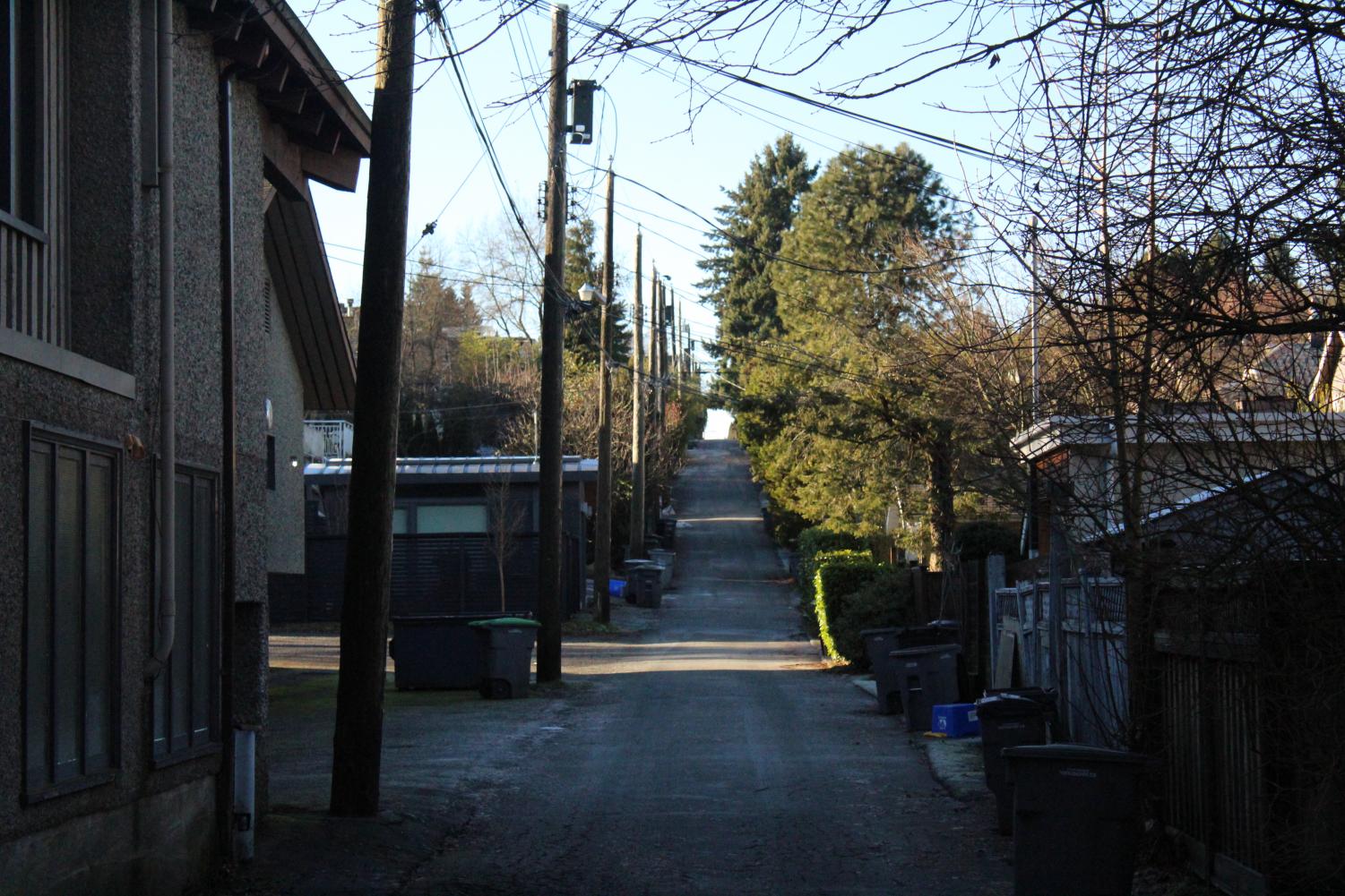 On the way to the airport, a quiet ally way leads up and over the hill. When I show Maggie my pictures on the plane, she says that this reminds her most of her home in China.