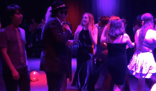 Pictured: Well dressed students dance in Community Highs Craft theatre.  
Everyone seems like they’re having a good time, and that makes me happy, said Sam Ramser, a student in the Levin forum.