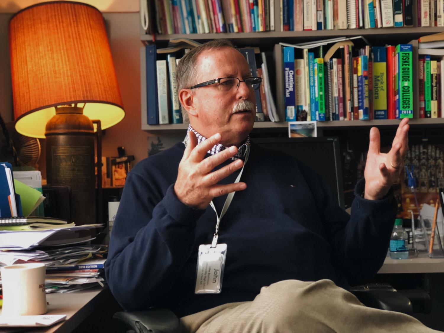 John Boshoven sits in his office at Communty High. Boshoven’s colleague and fellow counselor Brian Williams looks forward to having the “office with the window” when Boshoven is gone.