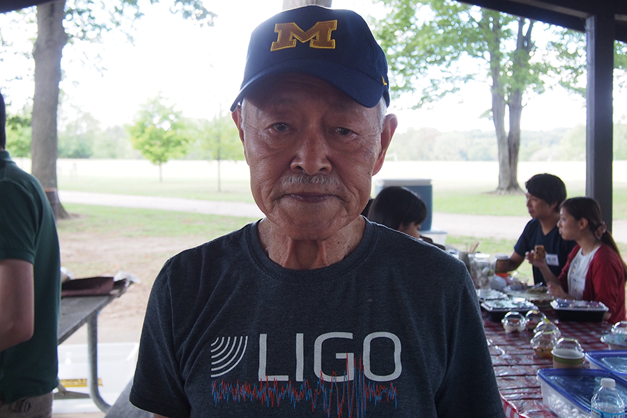 Dr. Tomozawa, nearly 90 years old, remains an ever active member of the physics community. He proudly wore his t-shirt of LIGO, the observatory that confirmed the existence of gravitational waves. 