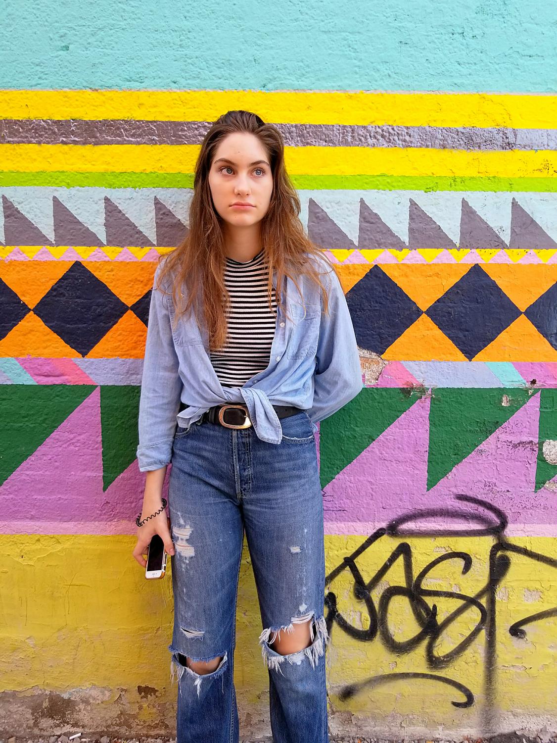 Hey, my name is K.c. and I took these portraits at different murals in ann arbor for Steve's photography class.