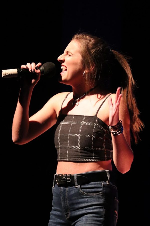 Pioneer Junior Briget Roberts sustaining a high note during her performance. Her song earned her a standing ovation and a spot in the top five.