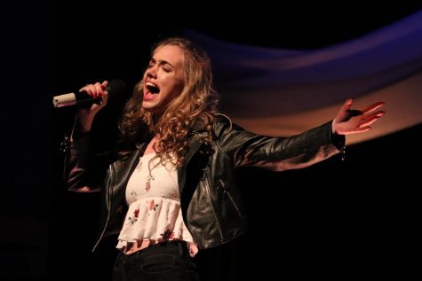 ECA Junior Greer Taylor performing with Seth Dyer during the final performances of the night. The duet earned Tayler and Dyer a standing ovation and landed them in the top 5.