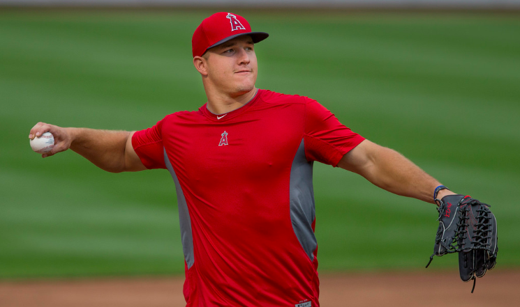 Los Angeles Angels center fielder Mike Trout flexes his muscle