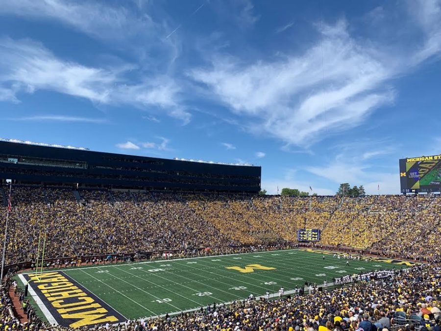 The Big House is packed with students and football fans on a Saturday morning.