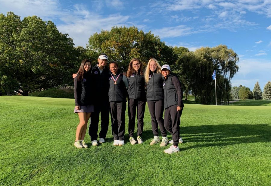 The+Pioneer+golf+team+poses+for+a+photo+on+the+18th+green+following+the+award+ceremony.+They+were+awarded+8th+place+and+Amaya+Melendez+finished+tied+for+9th.+