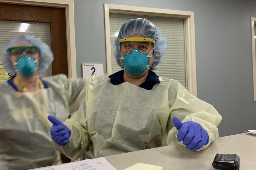 Dr. Grace Jenq gives an optimistic thumbs up to the camera wearing her PPE (Personal Protective Equipment). Soon after this picture was taken, she would become head of Phase 5 Post Acute Care at the Michigan Medicine field hospital.