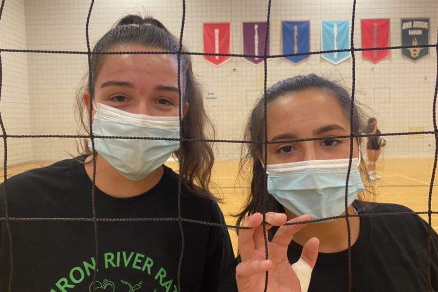 This is a photo taken at a Huron High School Volleyball practice. For the safety of ourselves and our community, athletes play in masks. How have athletics changed in the middle of a pandemic, and is it safe to play?