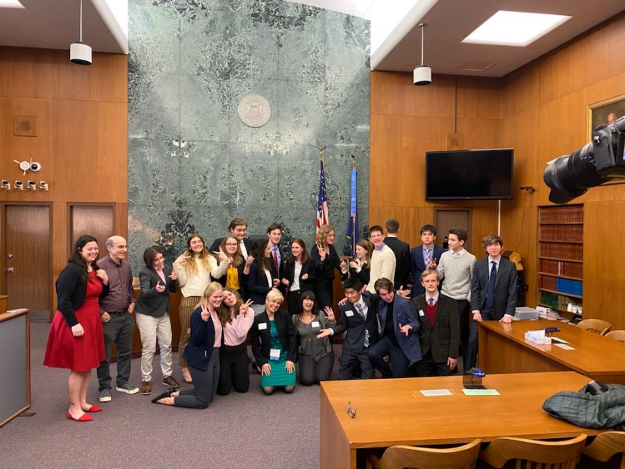 The+CHS+Mock+Trial+Team+poses+in+the+Washtenaw+County+Courthouse+after+their+2020+Washtenaw+Regionals+Competition.+Both+the+CHS+teams+won+Regionals+that+year+and+were+slated+to+compete+at+the+state+competition%2C+but+COVID-19+resulted+in+the+tournaments+cancellation.