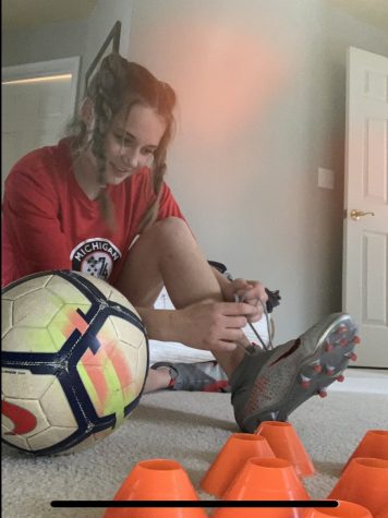 I wanted to capture my happiness of getting to tie my cleats up and train everyday. The joy of knowing that just doing some simple cone drills will help me get better and help me achieve my goal of playing soccer in college motivates me every day.