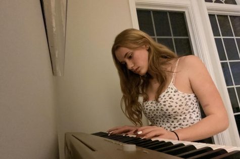 I chose this photo of myself because it represents what I enjoy doing when I’m not on Zoom. I have a passion for playing the piano. I love it because I find it as a way to express myself in ways that words cannot.