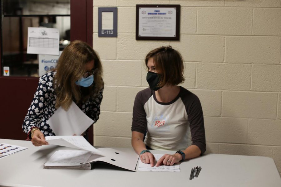 Gretchen Eby and Courtney Kiley worked during the week to check students in for testing. 
