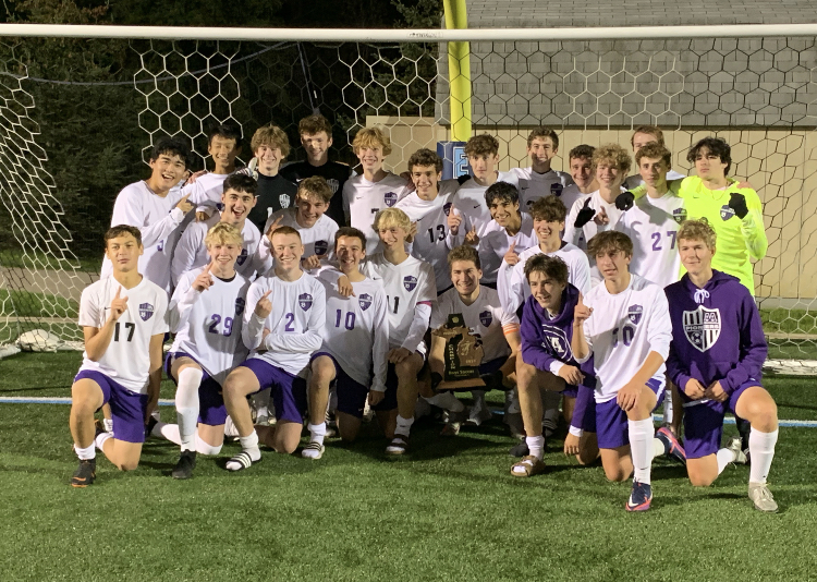 The Ann Arbor Pioneer Boys Varsity Soccer team poses with the district championship trophy. Pioneer defeated their in-city rival, Ann Arbor Skyline, by a score of two to one en route to a regional playoff appearence. Weve built a good team envioronment, said Calvin Paulick, Community High School senior and midfielder for the Pioneers. We push each other to work hard in practice. We all want the team to succeed and we want each other to succeed.

Photos Courtesy of Calvin Paulick