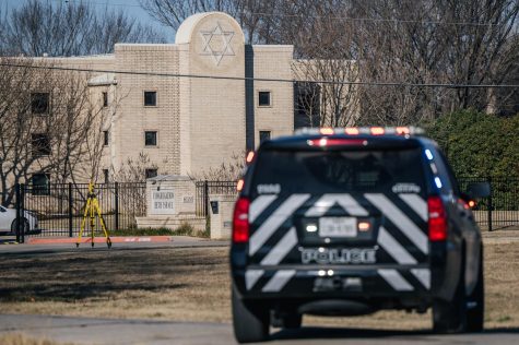 A law enforcement vehicle sits near the Congregation Beth Israel synagogue on Jan. 16, 2022, in Colleyville, Texas.