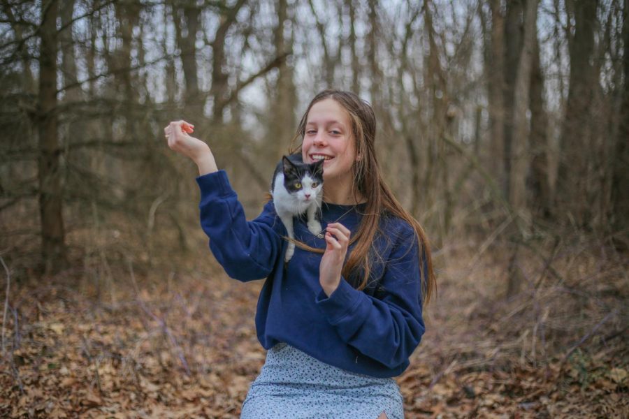 Lauren MacNeil holds her kitten, Marty outside. Her family rescued two kittens and fostered seven others in quarantine. “I love connecting with animals; having kittens in quarantine helped me stay distracted through the unknown,” MacNeil said. 