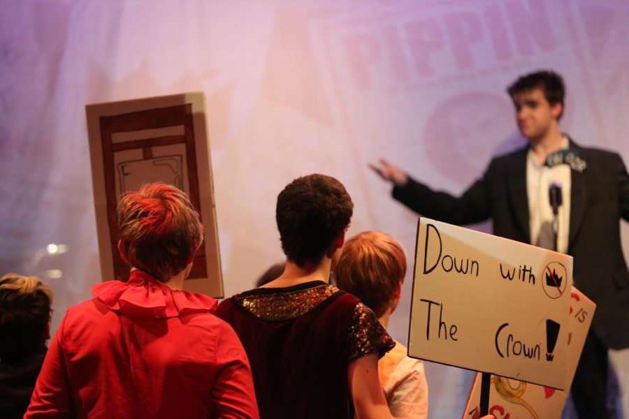 Pippin%2C+played+by+CHS+senior+John+Reed%2C+rallying+a+crowd+of+protesters+while+plotting+to+overthrow+his+father.