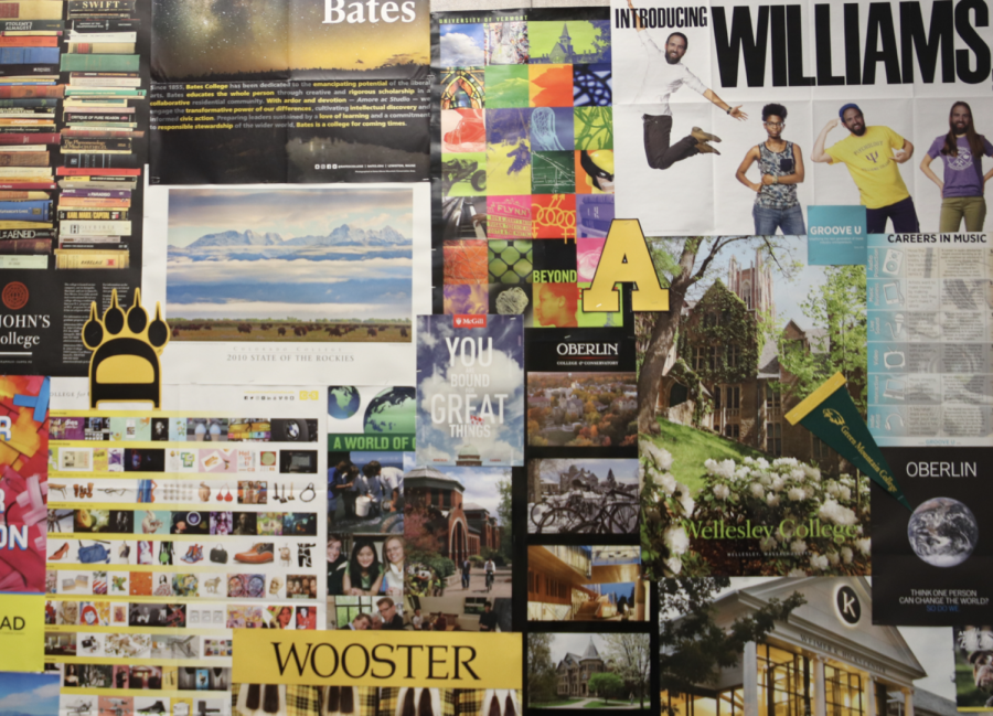 A billboard in the counselor’s office displays a wide range of college pamphlets and fliers. As semester two started, seniors wrapped up college application and received decisions. “Don’t panic,” Williams said. “There are good college fits for all students.” Photo by Natalie Mycek-Card