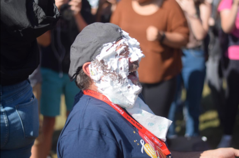 Steve Coron gets pied in the face at the annual pi day celebration at CHS.
