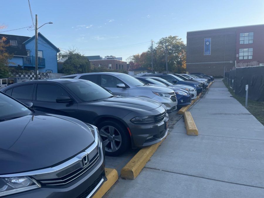 Cars+parked+in+front+of+CHS+on+Monday%2C+Oct.+24.+The+school+does+not+lease+spaces+from+the+city%2C+instead+distributing+parking+passes+to+seniors+each+year%2C+who+then+fight+for+one+of+the+30+student+spaces+in+front+of+the+school+every+day.