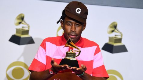 Tyler, The Creator holds the award for Best Rap Album, presented by the 62nd Annual Grammy Awards at the press room in Los Angeles