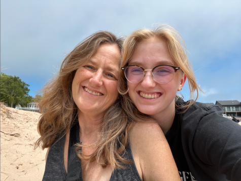 Ria Lowenschuss and her mother pose on a beach up north in Michigan.