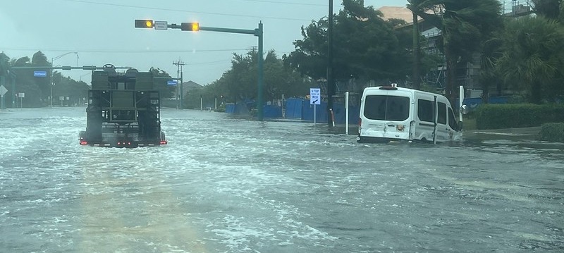 Water floods the urban street while wind roars through palm trees

Photo was taken on Sept. 28 when Hurricane Ian made direct landfall over Florida