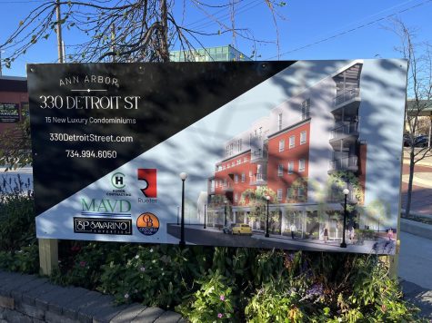 An advertisement on 330 Detroit Street for 15 new luxury condominiums. The new flat-iron five-story complex will replace the building that currently houses Teriyaki Time.