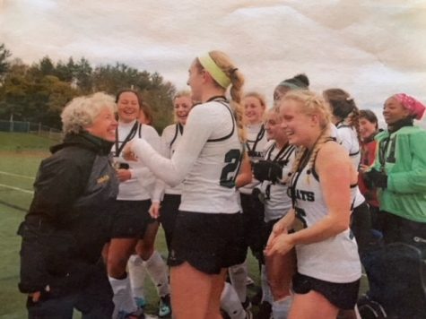 Lauren Hall (far left) celebrates with her Ann Arbor Huron field hockey team after a win. Hall has coached the River rats since 2016, winning back-to-back state titles in 2017 and 2018.
There are often struggles to get equitable field time for our varsity womens programs, Hall said. My varsity and JV team have to split the field for practice every single day.