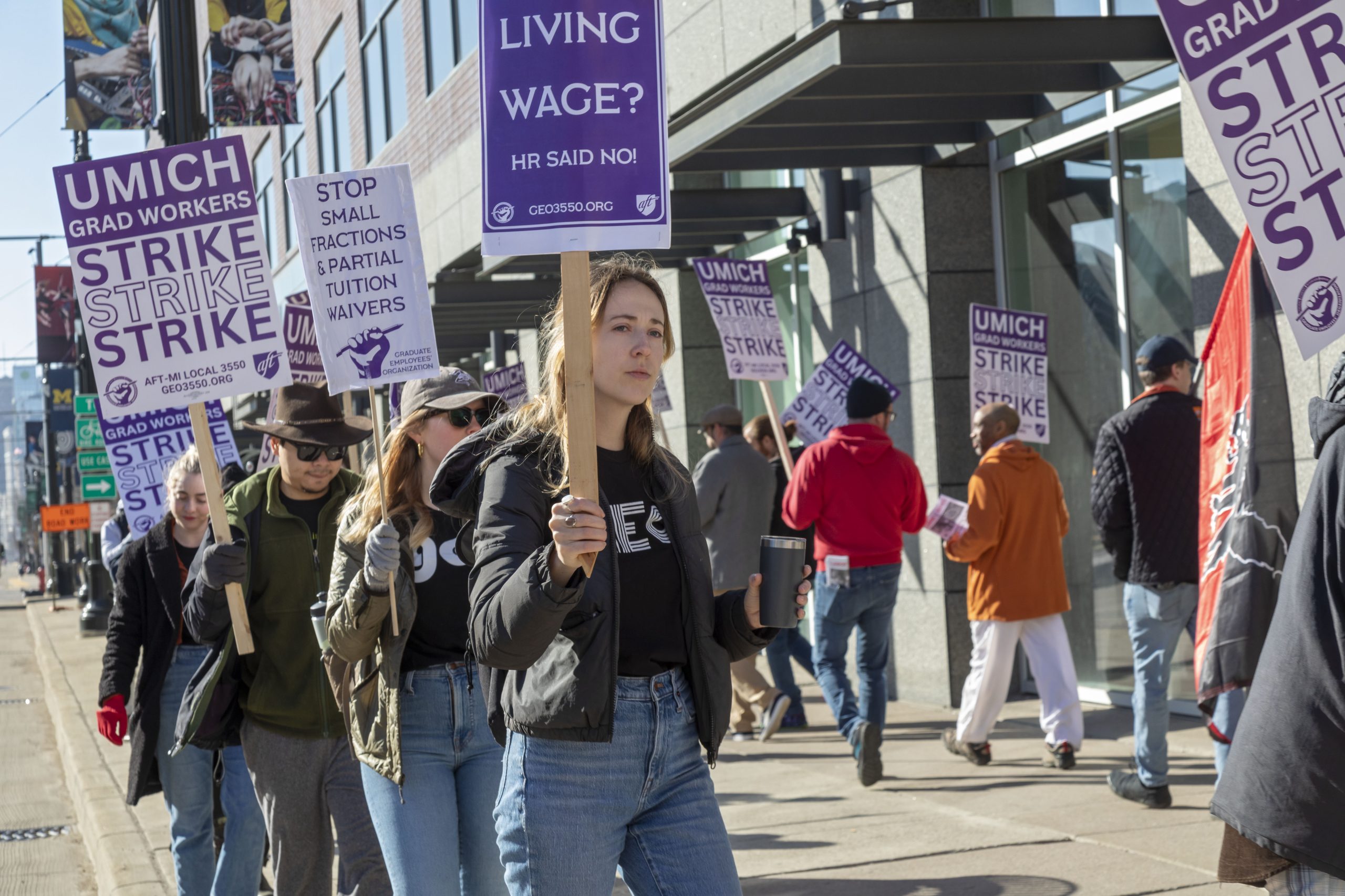 Graduate student employees at the University of Michigan picket the universitys Detroit Center during their strike for a living wage on April 3, 2023.